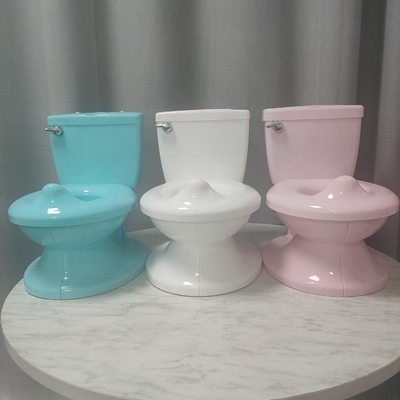 Παιδική τουαλέτα βουτιά με Flushing Sound λευκό μπλε ροζ στερεό σχεδιασμό